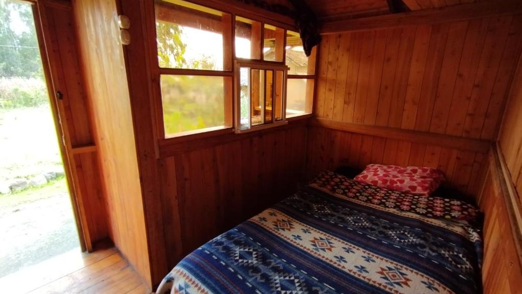 Postel nebo postele na pokoji v ubytování El Tio Hostal