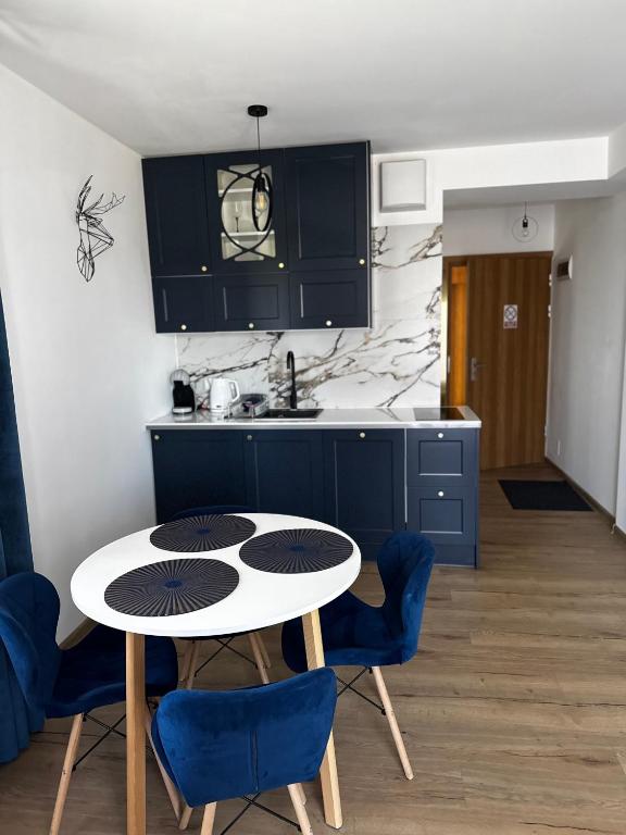 Kuchyňa alebo kuchynka v ubytovaní Apartament w Białce Tatrzańskiej