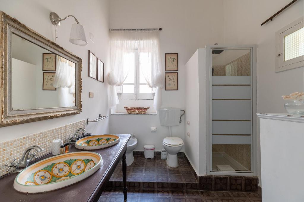 Koupelna v ubytování Milonghita Apartment Ortigia