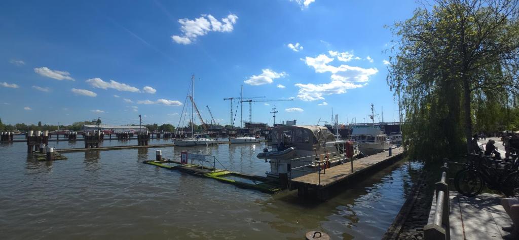 a marina with boats docked in the water at Ferienwohnung in Brunsbüttel mit E-Bike Verleih in Brunsbüttel