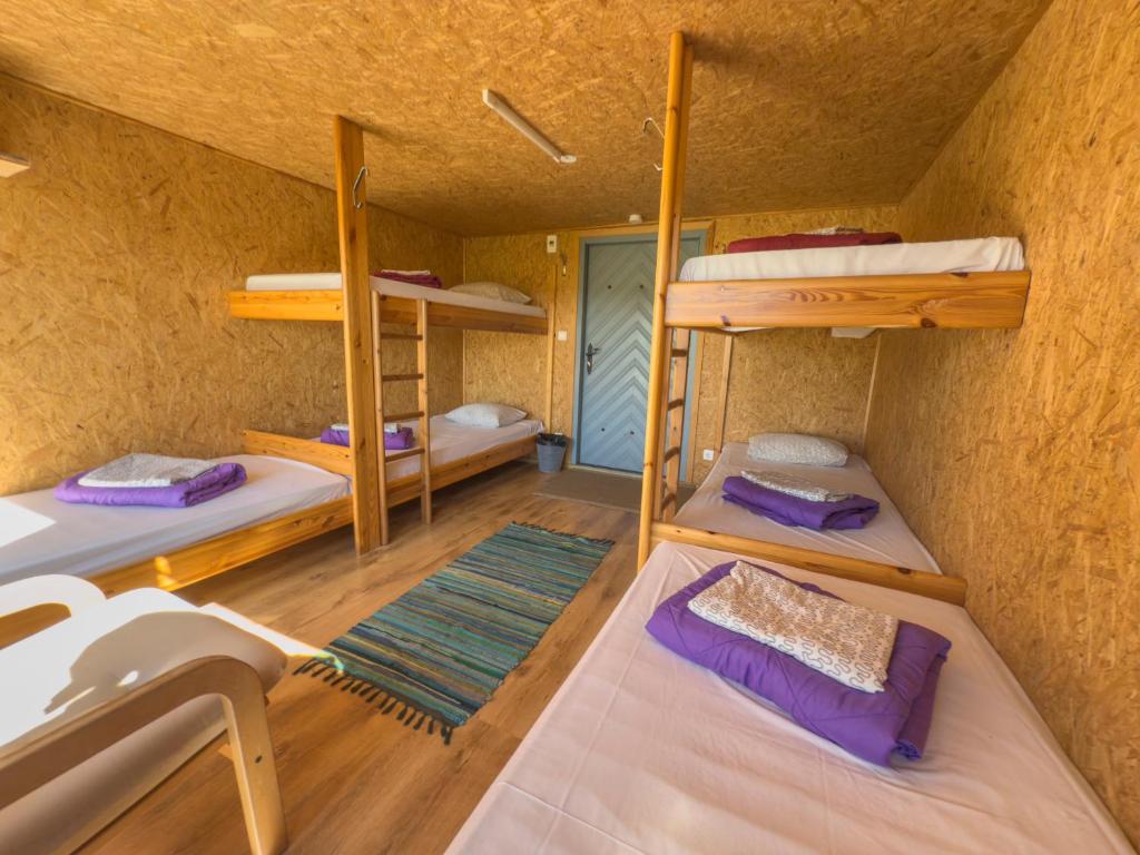 Postel nebo postele na pokoji v ubytování Ratturi talu