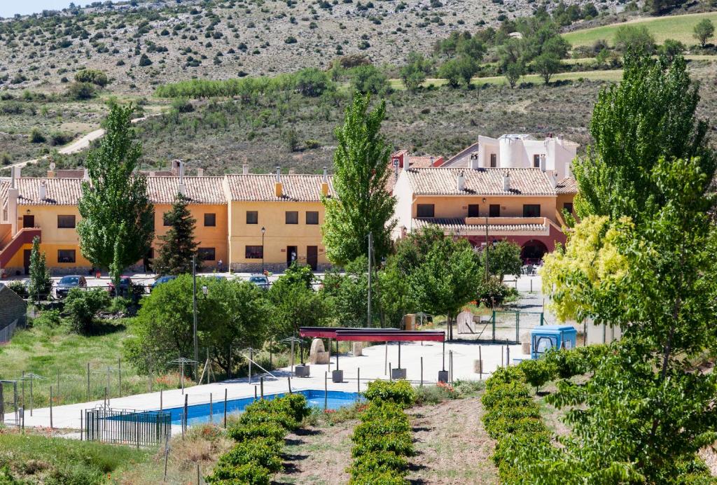 Bazén v ubytování CASERIO INAZARES - PISCINA VERANO SIN CALOr nebo v jeho okolí