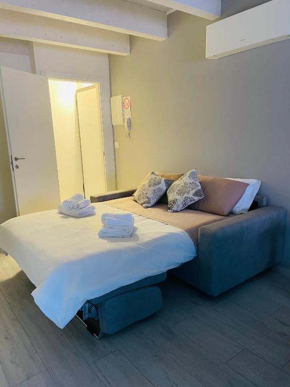 Postel nebo postele na pokoji v ubytování B&B La Fortezza
