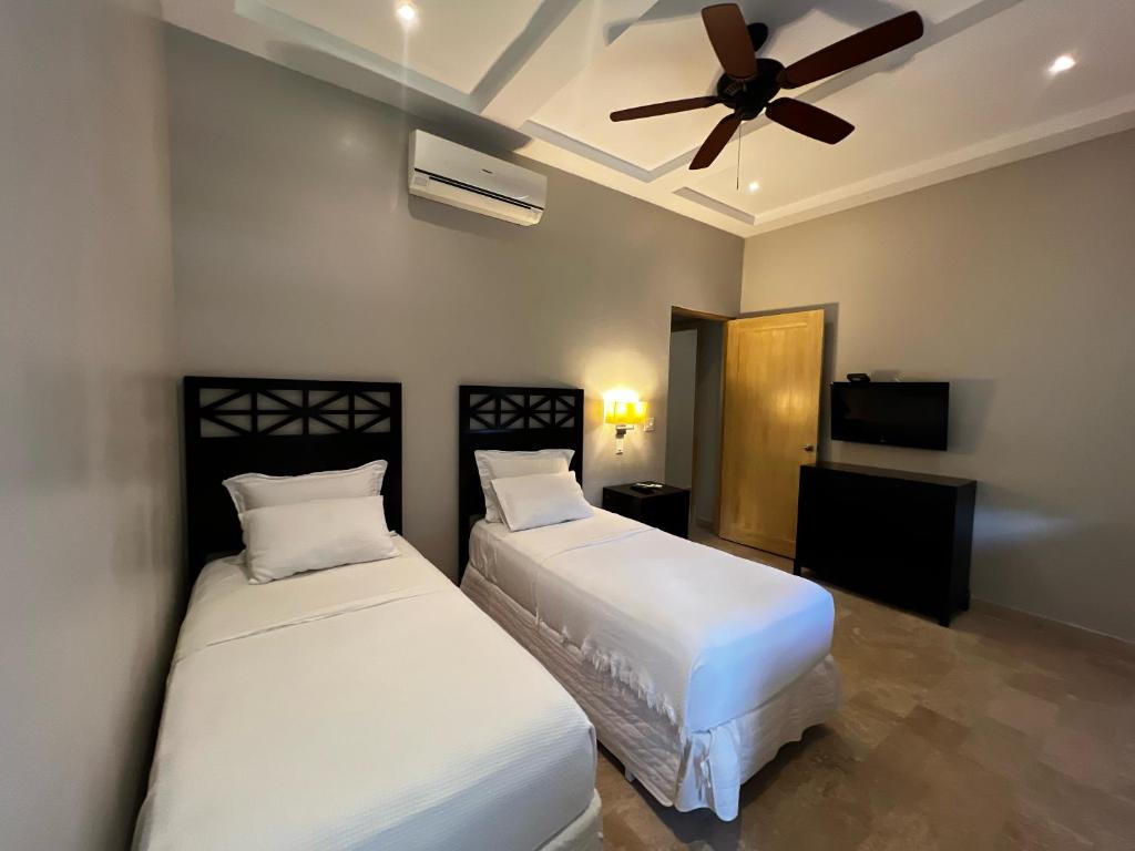 Postel nebo postele na pokoji v ubytování Paseo Suites El Valle, Luxury Apartments