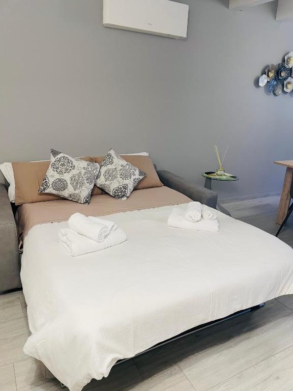 Postel nebo postele na pokoji v ubytování B&B La Fortezza