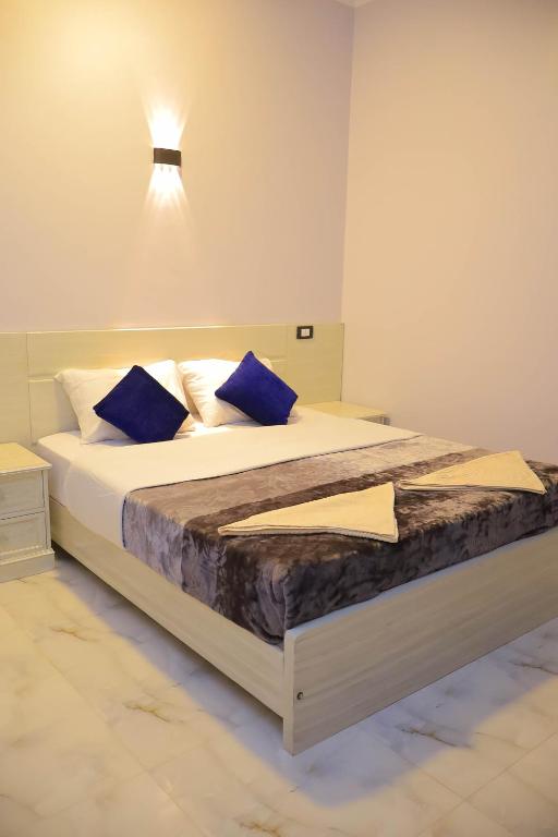 Postel nebo postele na pokoji v ubytování Rayan Nubian Guest House