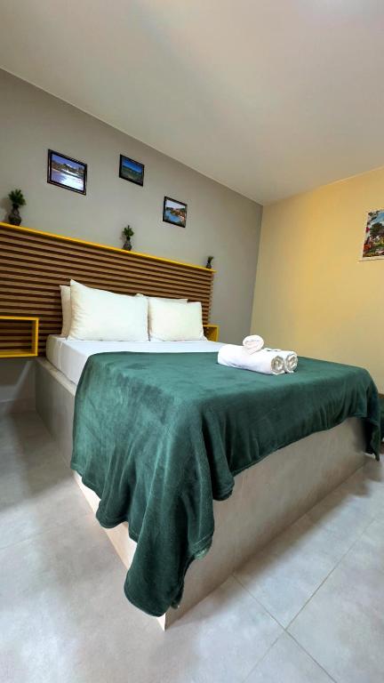 Postel nebo postele na pokoji v ubytování Flat Chamego Triplo