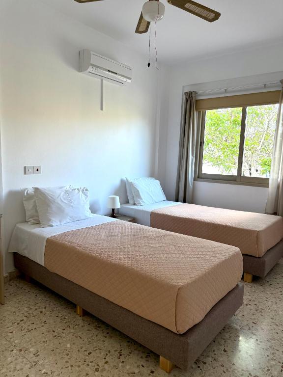 Un ou plusieurs lits dans un hébergement de l'établissement Himonas Apartments