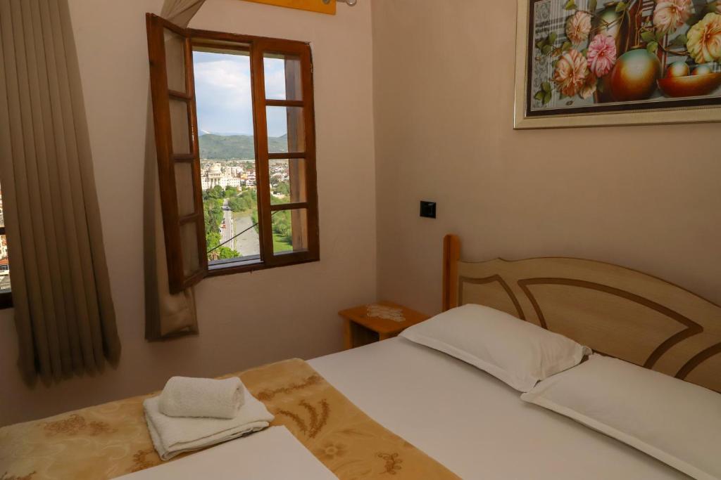 Voodi või voodid majutusasutuse Guest House LION toas