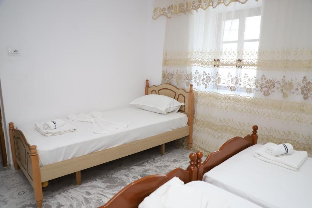 Voodi või voodid majutusasutuse Guest House LION toas