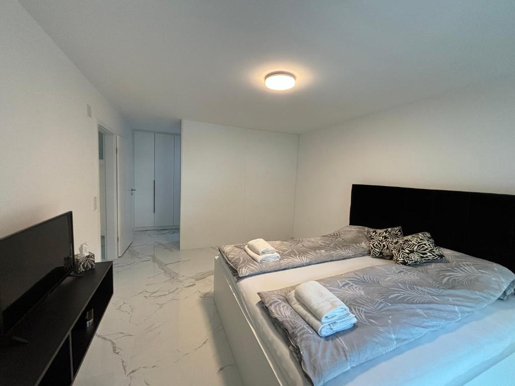 Postel nebo postele na pokoji v ubytování Villa HM am Waldrand