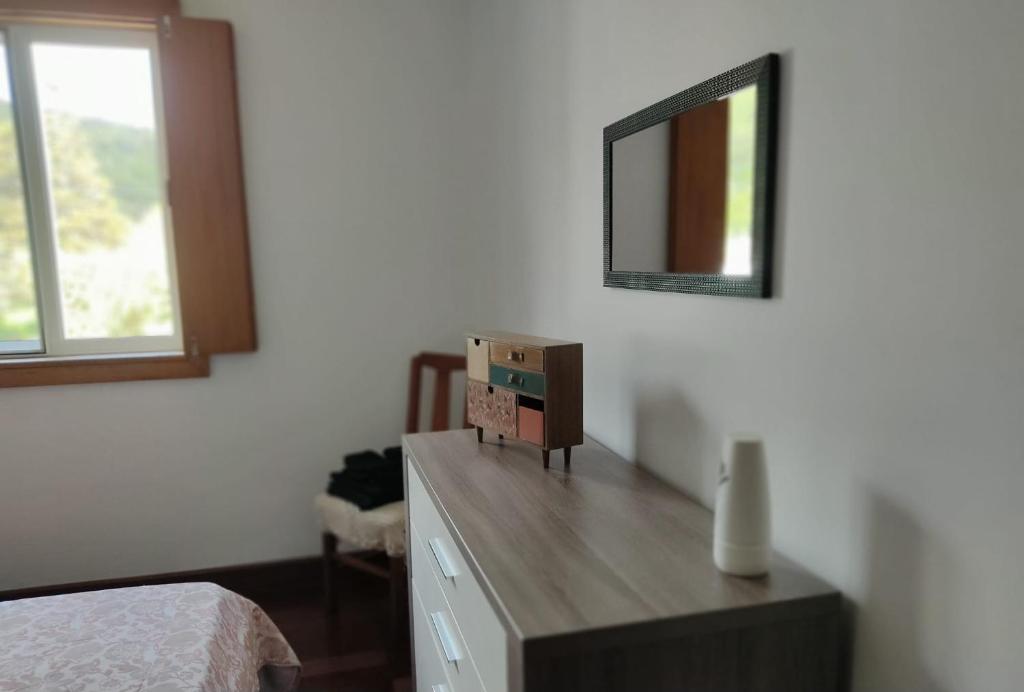 Postel nebo postele na pokoji v ubytování Complexo Vulcânico