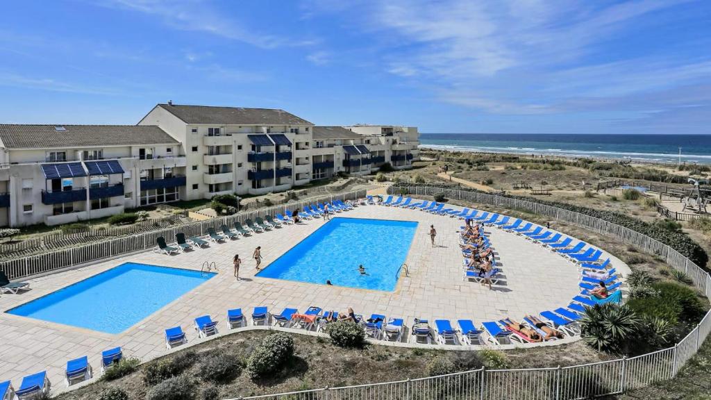 Photo de la galerie de l'établissement Résidence Bleu Marine - Appartement 4 personnes, une chambre dans résidence avec piscine à Lacanau Océan MAE-0481, à Lacanau