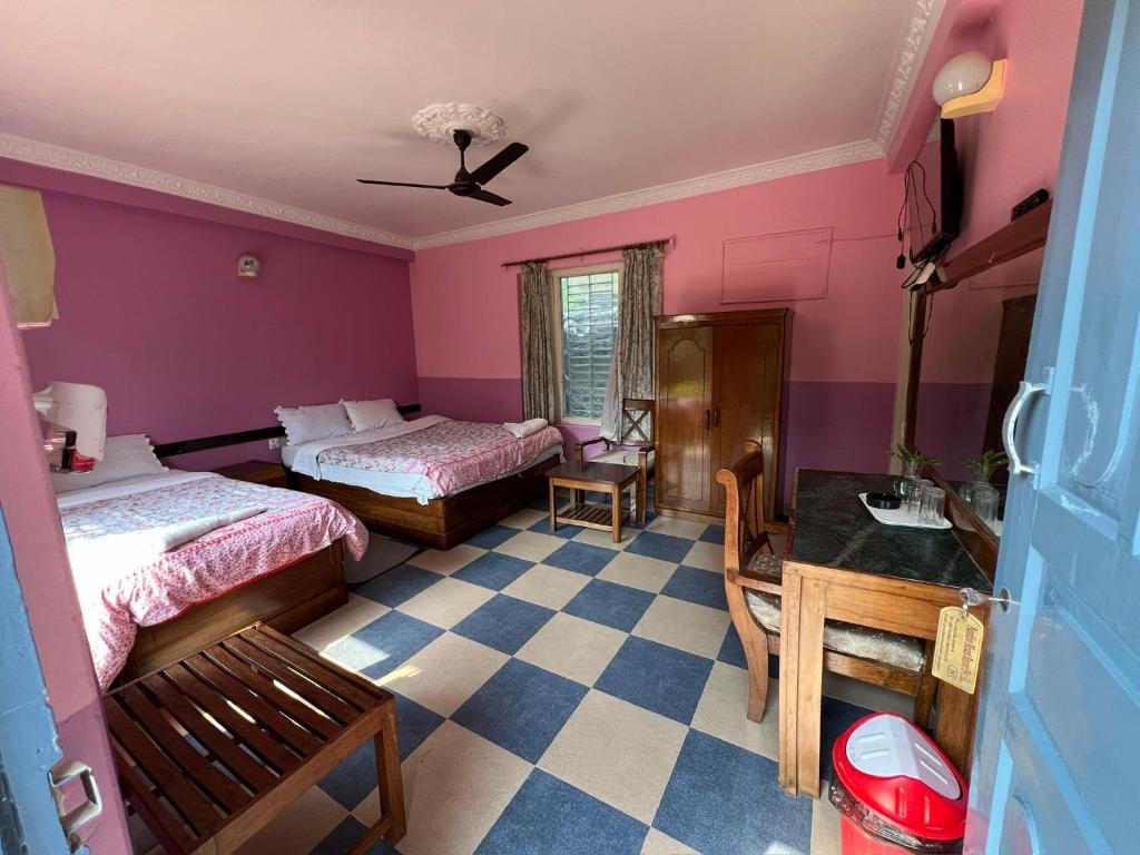 Llit o llits en una habitació de Paradise Mount Resort