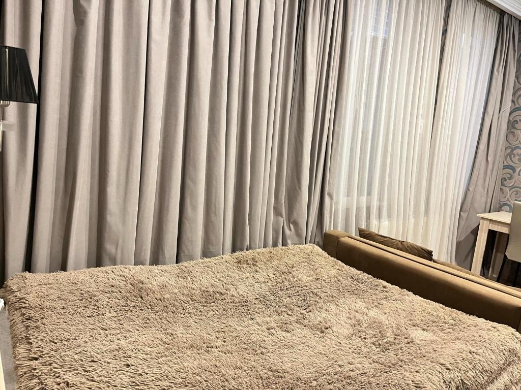 Postel nebo postele na pokoji v ubytování Oasis Mtskheta