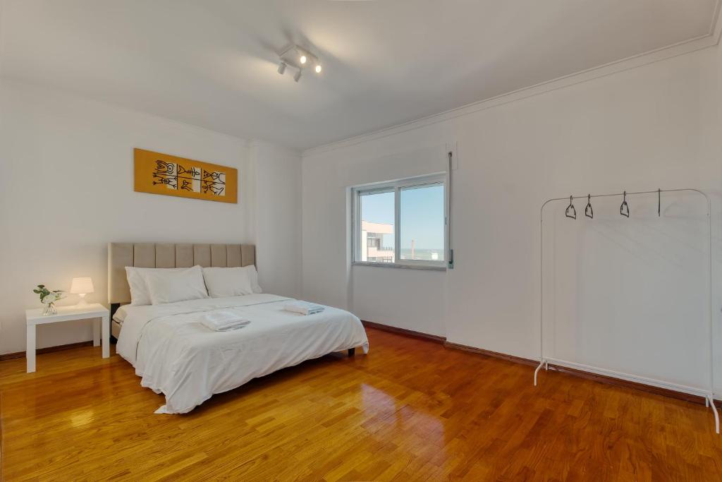 Imagen de la galería de Quarto duplo com vista rio num apartamento partilhado, en Bobadela