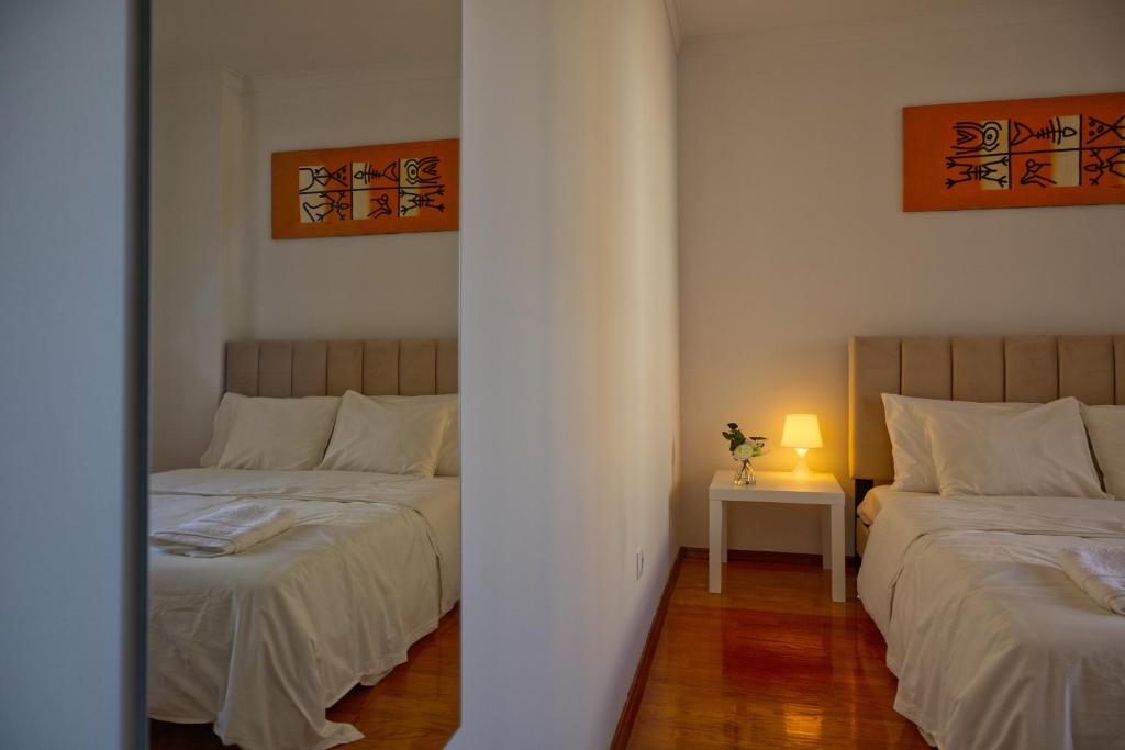 Imagen de la galería de Quarto duplo com vista rio num apartamento partilhado, en Bobadela