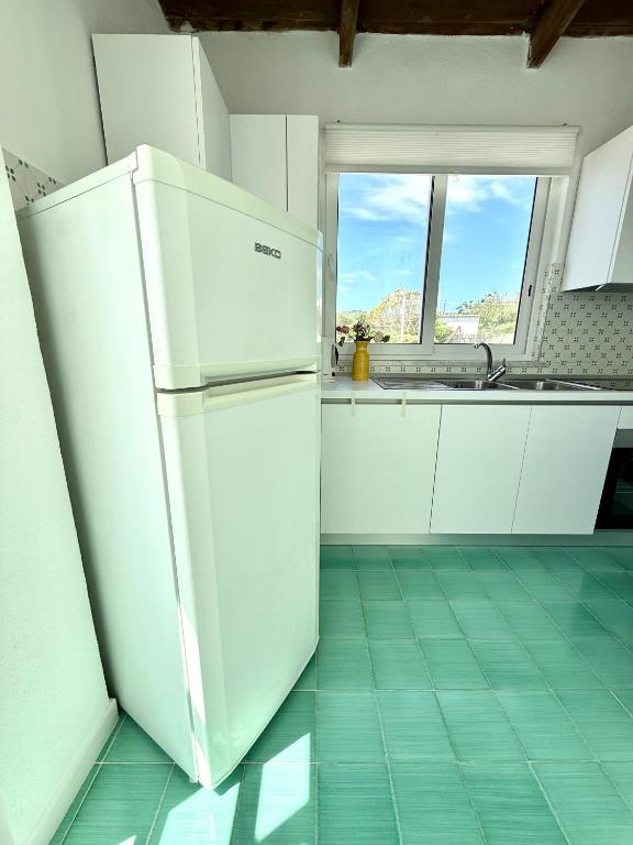 Kuchyň nebo kuchyňský kout v ubytování Villa Egidio