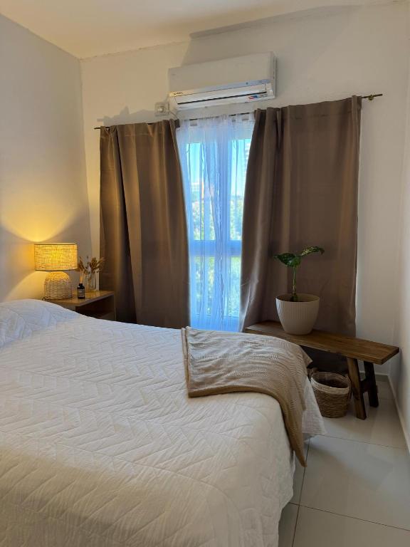 Postel nebo postele na pokoji v ubytování Amané - Alquiler temporal con estilo en Posadas