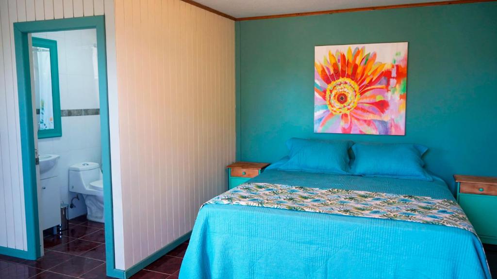 Postel nebo postele na pokoji v ubytování Kuhane Etno-Hostal