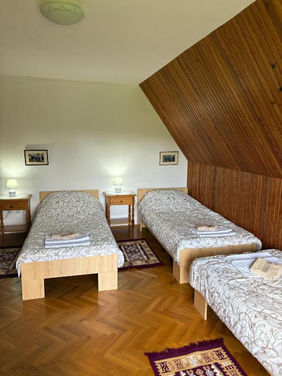 Postel nebo postele na pokoji v ubytování Vila Trtović