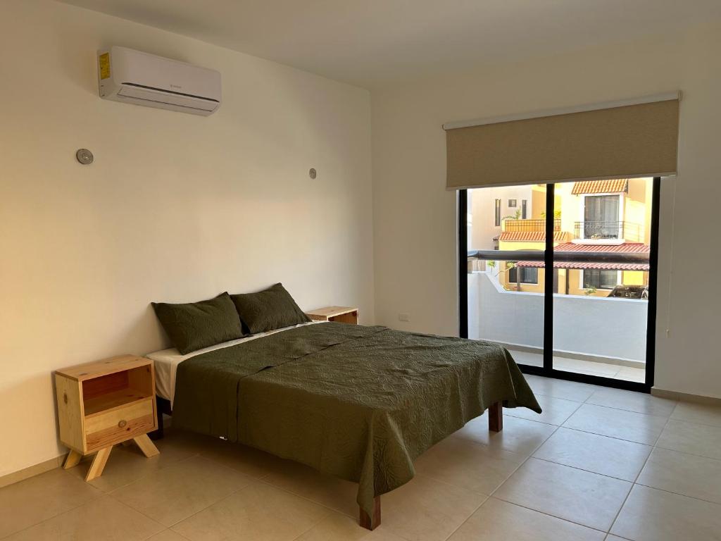 Postel nebo postele na pokoji v ubytování Habitación privada en casa particular - cama queen size