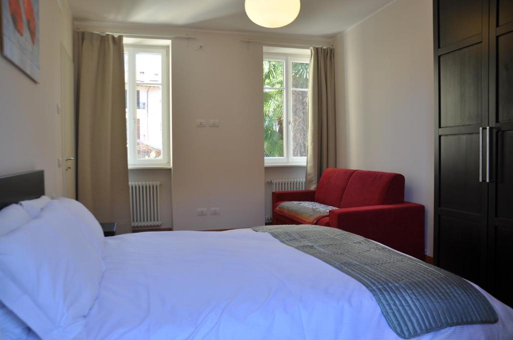Ένα ή περισσότερα κρεβάτια σε δωμάτιο στο Casa Lari Stresa