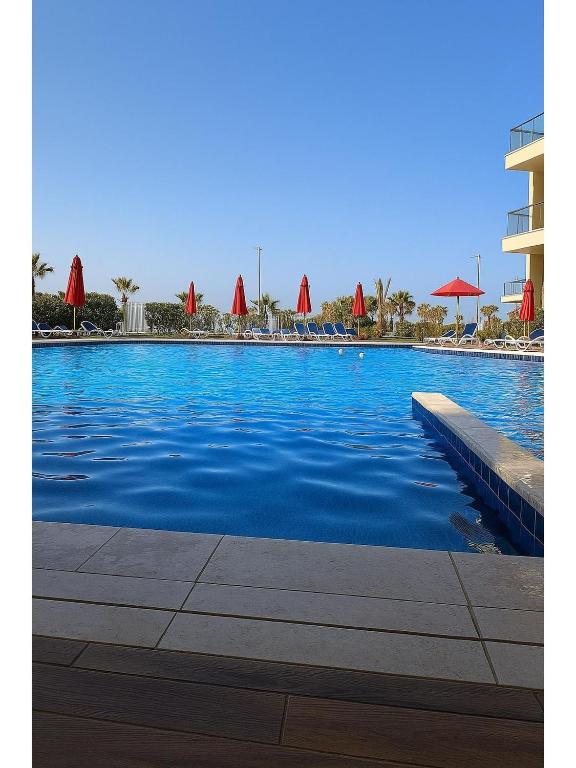 Bazén v ubytování Porto Said Tourist Resort Luxury Hotel Apartment nebo v jeho okolí