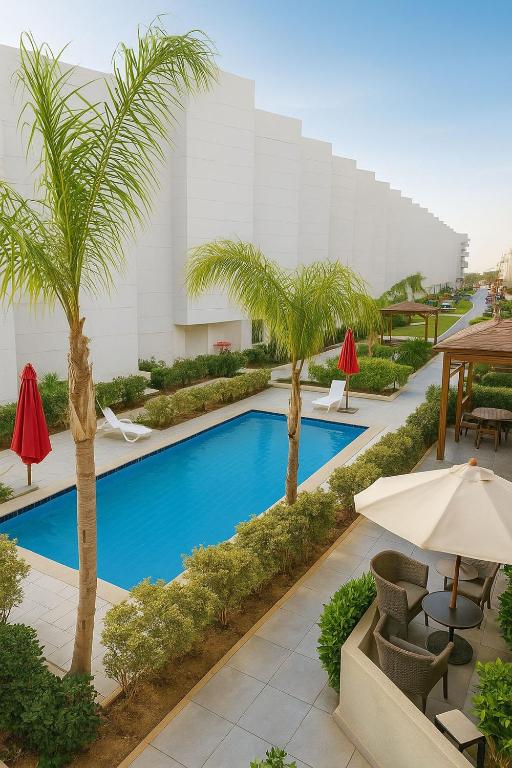 The swimming pool at or close to Porto Said Tourist Resort Luxury Hotel Apartments