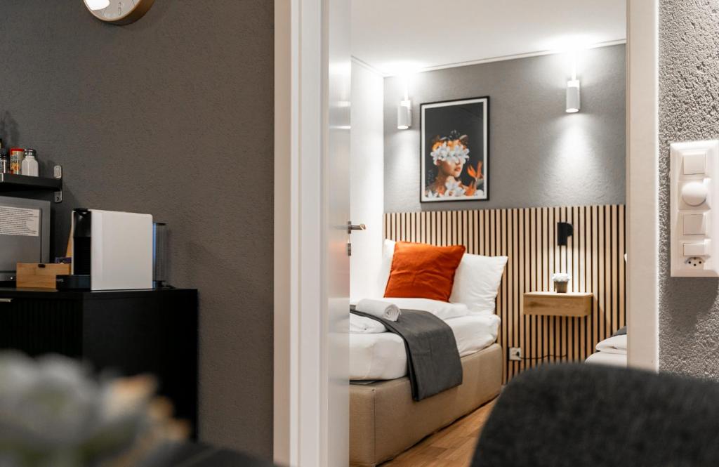 Postel nebo postele na pokoji v ubytování Spirit Apartments - Balkon - Bergsicht