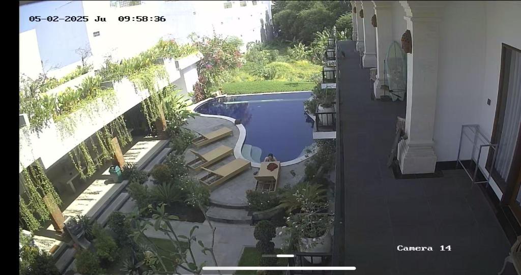 Un balcón o terraza en Lila Loka Homestay