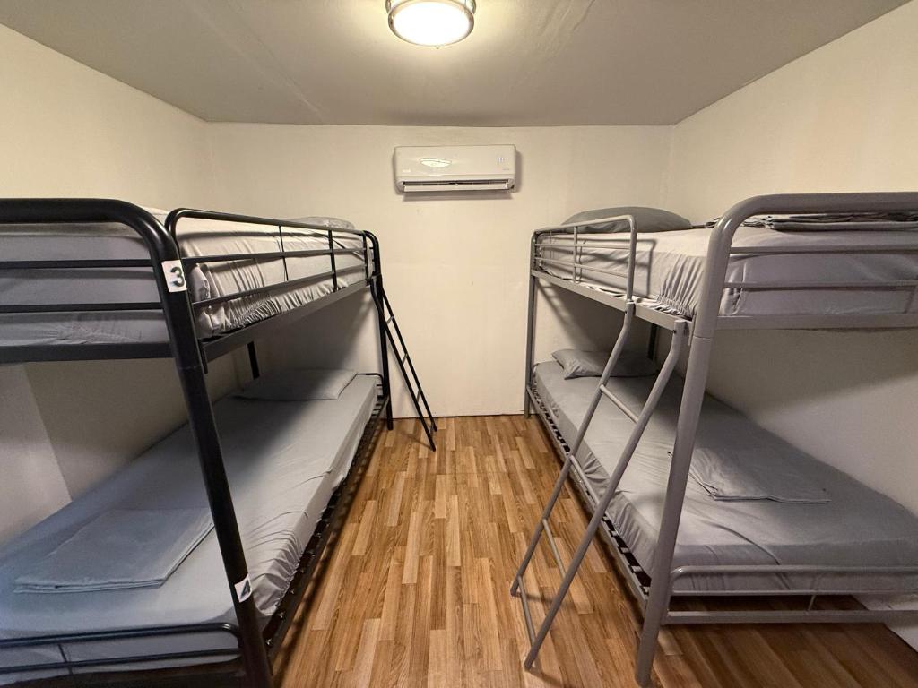 a room with two bunk beds in a room at OQP Vacations in Miami