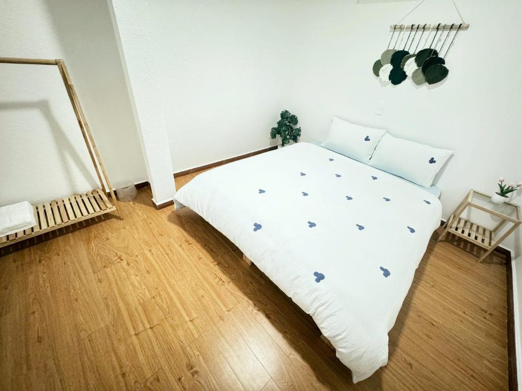 Postel nebo postele na pokoji v ubytování An Nhiên House