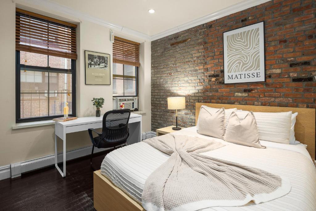 Postel nebo postele na pokoji v ubytování Hudson Yard comfort in the heart of Manhattan