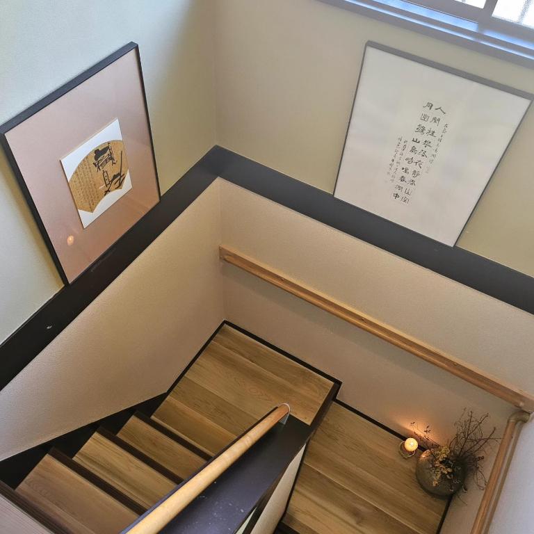 Postel nebo postele na pokoji v ubytování 五斗觀驛站 gotokan guest house