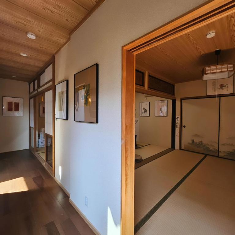 Postel nebo postele na pokoji v ubytování 五斗觀驛站 gotokan guest house