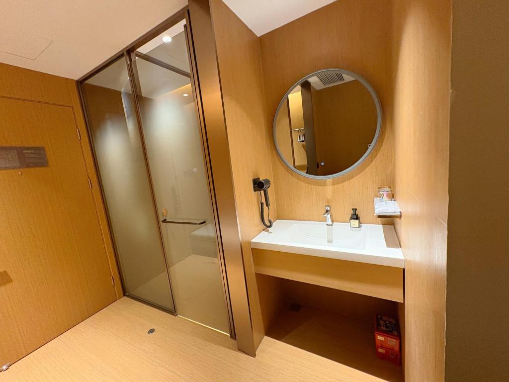Koupelna v ubytování Yibo Hotel - Pazhou Convention and Exhibition Center - Walking distance to Canton Fair