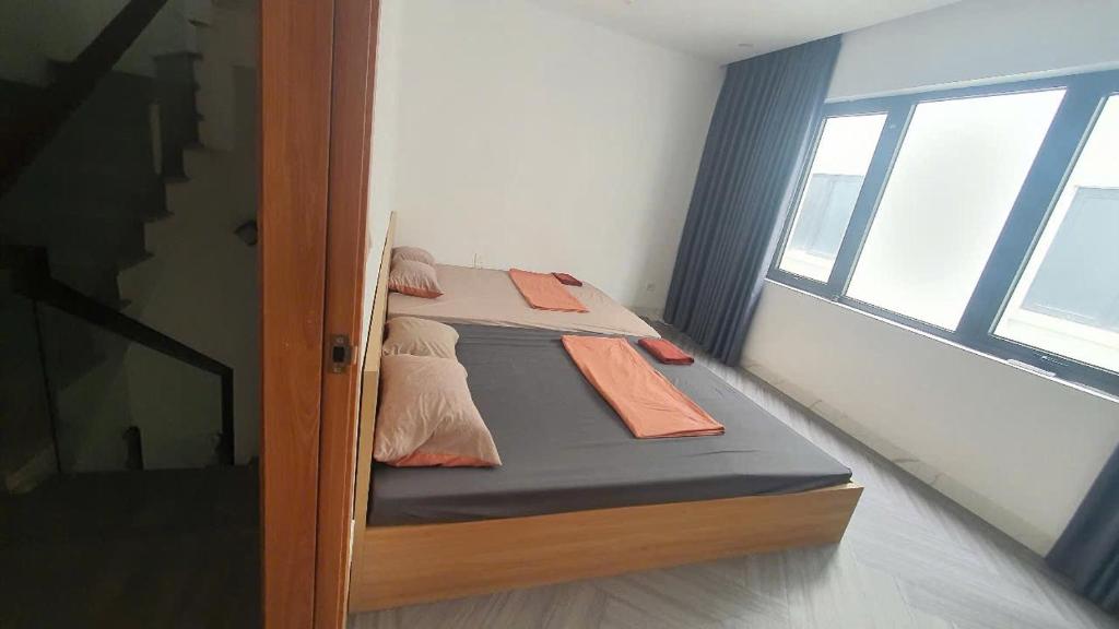 Postel nebo postele na pokoji v ubytování Homestay