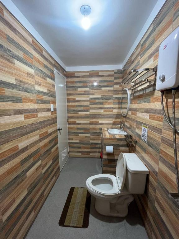 Koupelna v ubytování Carandang Tourist Inn