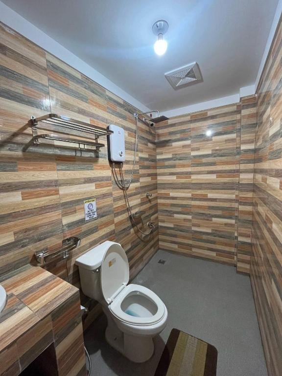 Koupelna v ubytování Carandang Tourist Inn