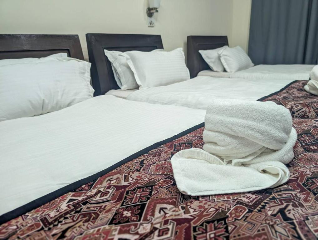 Postel nebo postele na pokoji v ubytování Apartment Hotel 11 Thamel