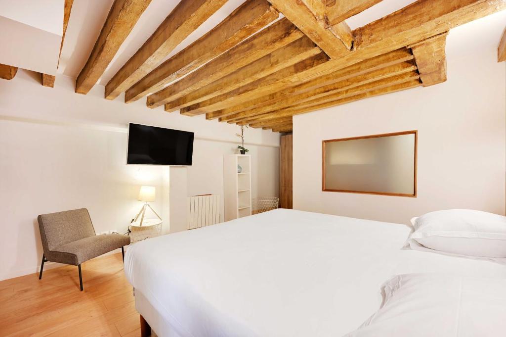 Posteľ alebo postele v izbe v ubytovaní Spacious apartment - 4BR-15P - Sentier-Grand Rex