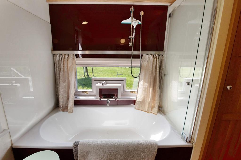 Voodi või voodid majutusasutuse Tiny House Ria toas