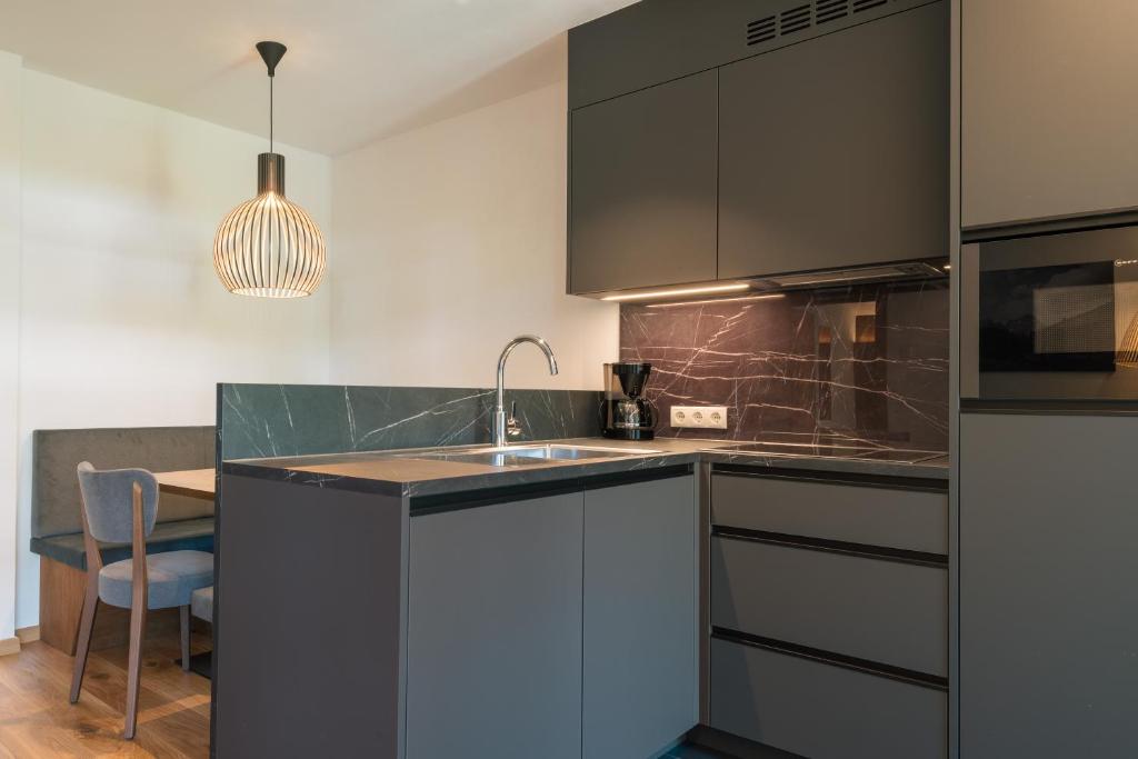 Kuchyň nebo kuchyňský kout v ubytování Appartement KroneLiving