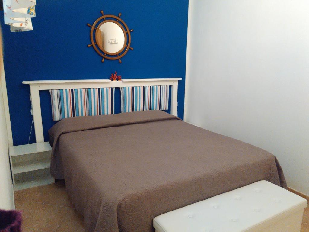 A bed or beds in a room at Casarizzo