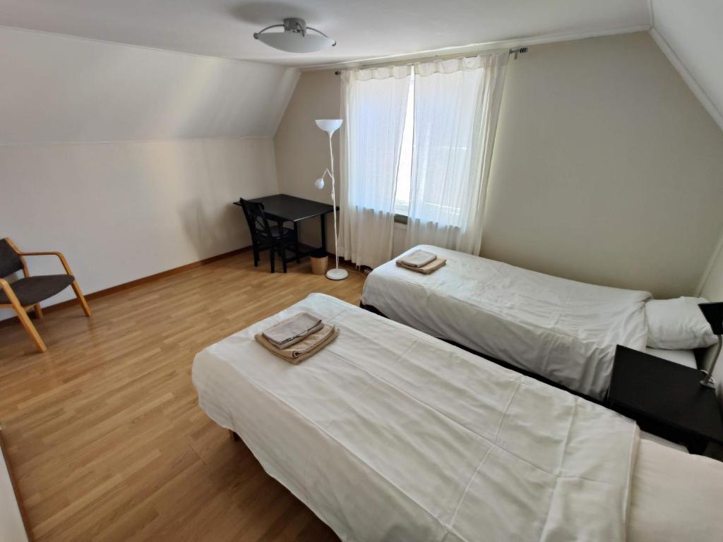 Postel nebo postele na pokoji v ubytování Wisby Trossen 4 AB