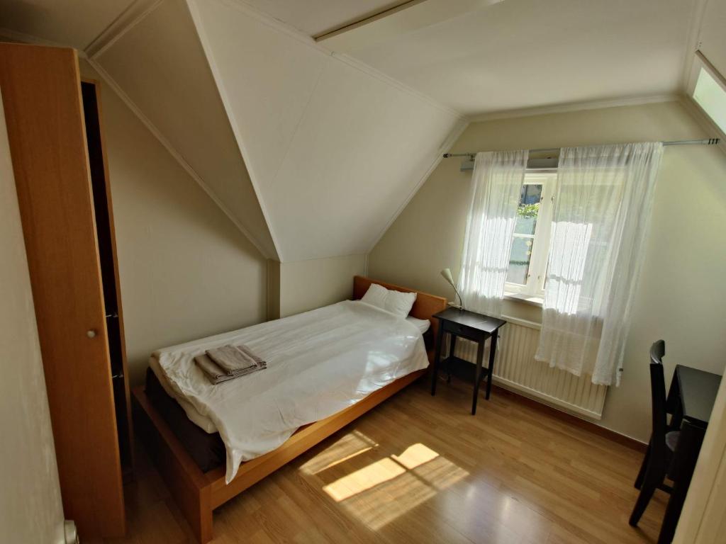 Postel nebo postele na pokoji v ubytování Wisby Trossen 4 AB