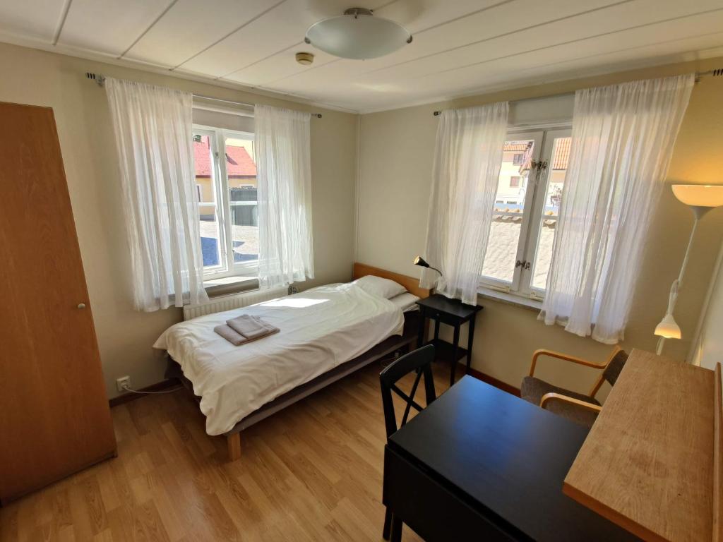 Postel nebo postele na pokoji v ubytování Wisby Trossen 4 AB