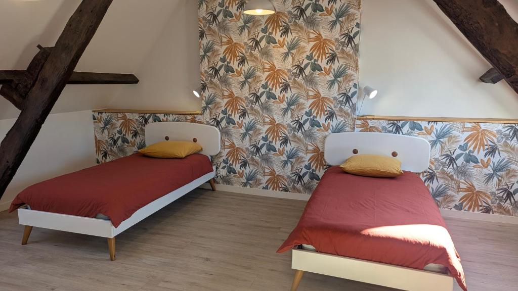 Posteľ alebo postele v izbe v ubytovaní Maison Normande proche de la mer et des lieux touristiques