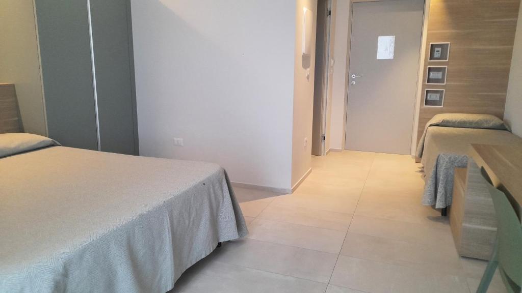 Postel nebo postele na pokoji v ubytování Villa Arlini